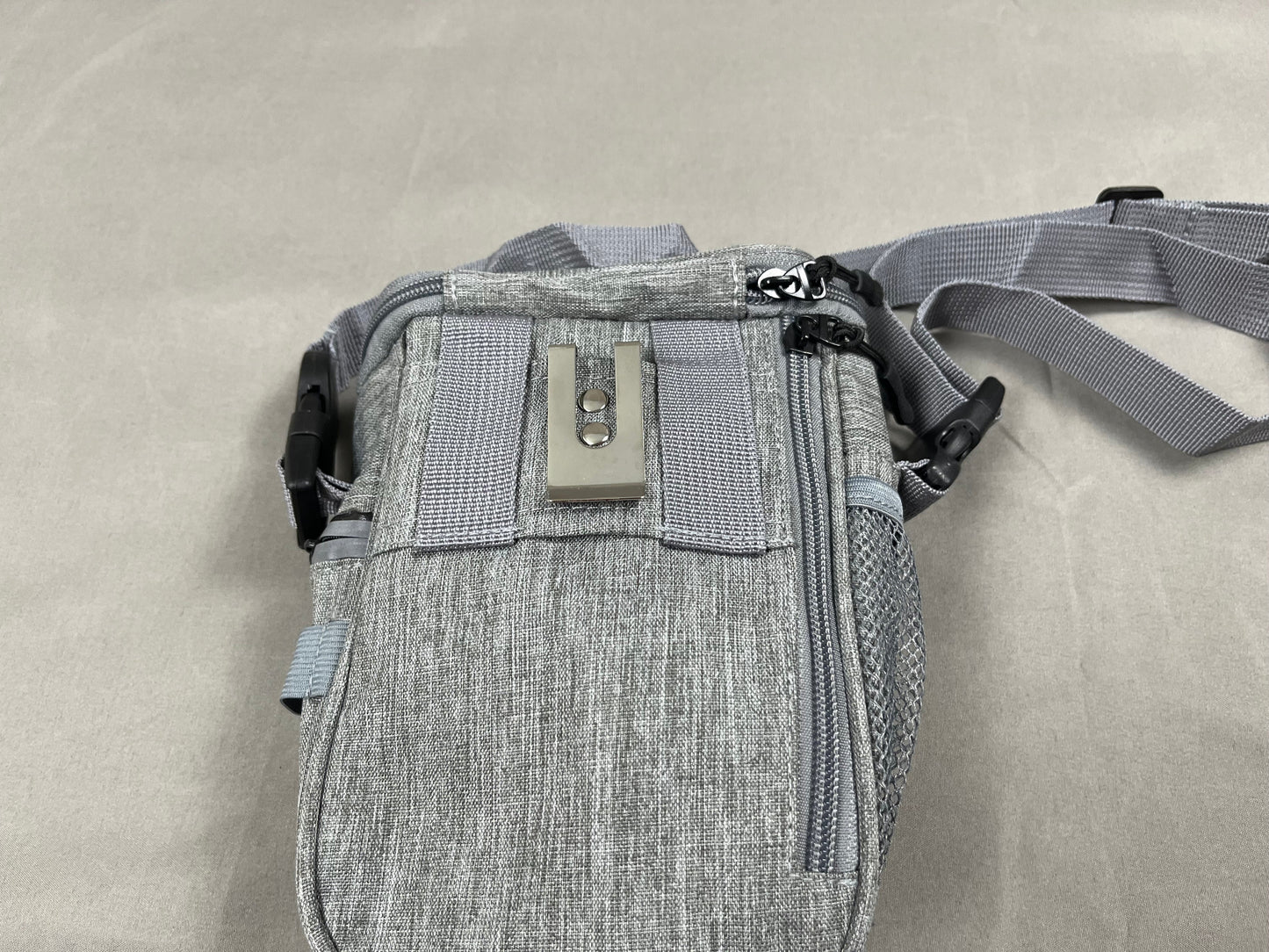 Dog walking bag with treat pouch and storage for training gear